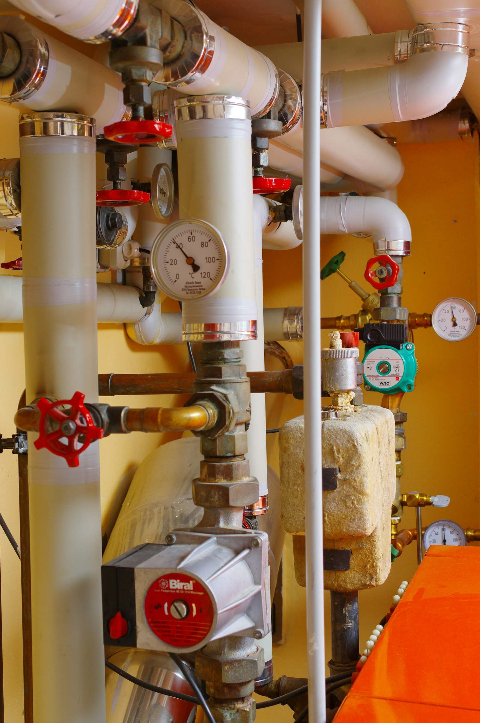 Heating system pipework, valves and pressure gauges
